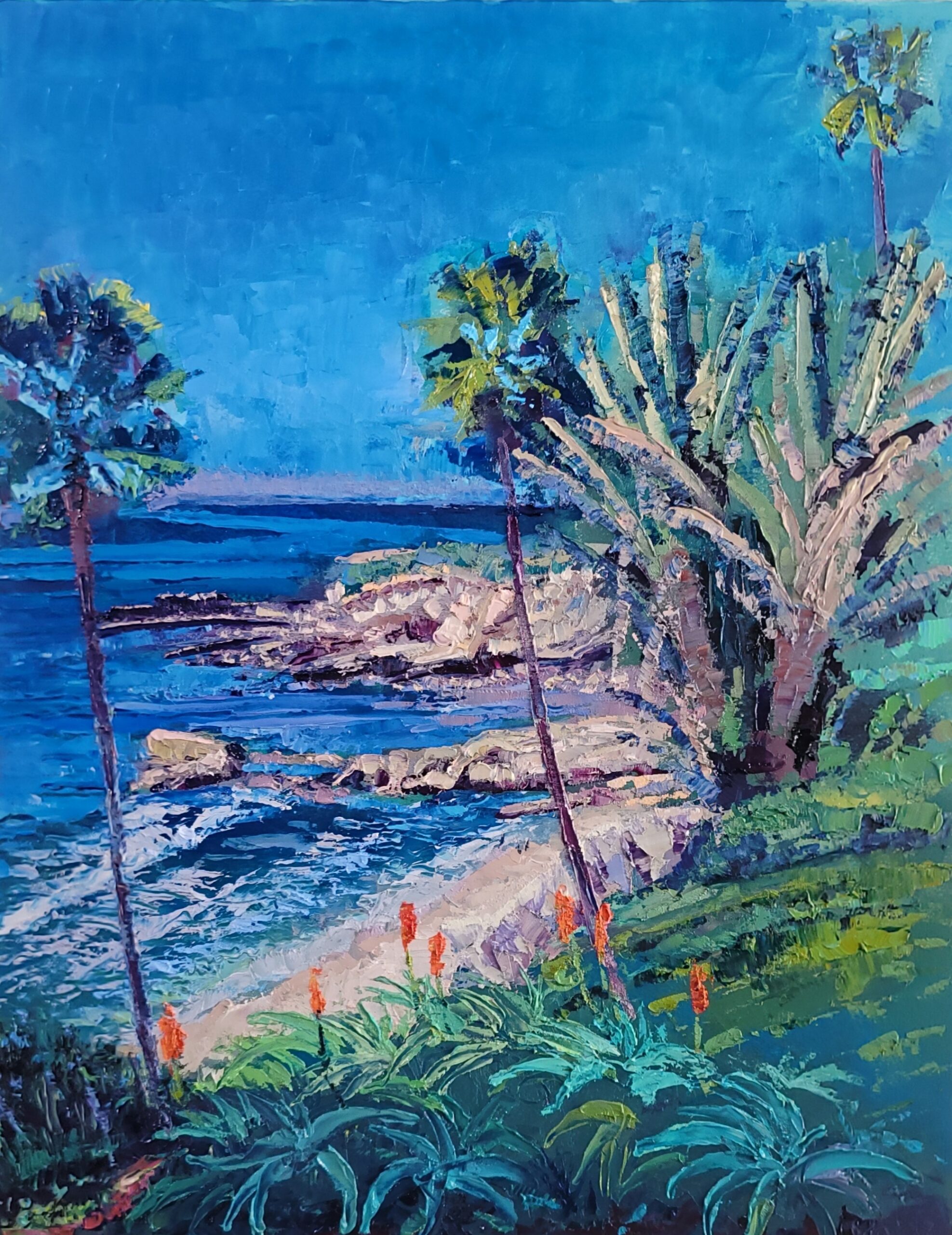 Vibrant seascape featuring palm trees and rocky coastline under a bright blue sky. Highlights tropical scenery, ideal for coastal travel content.